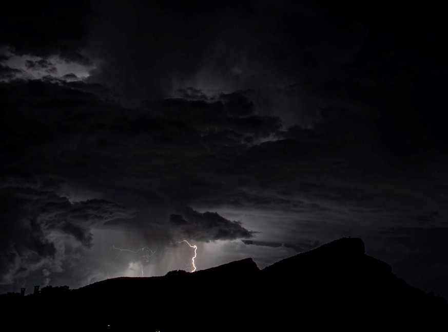 epa08847432 Thunder strikes over Sant Elm in Majorca, spain, during a thunderstorm late 27 November 2020 (issued 28 November 2020). EPA/CATI CLADERA