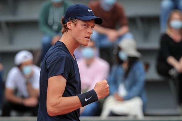 epa09249293 Jannik Sinner of Italy reacts during the 3rd round match against Mikael Ymer of Sweden at the French Open tennis tournament at Roland Garros in Paris, France, 05 June 2021. EPA/CHRISTOPHE  ...