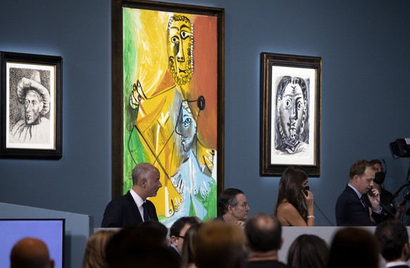 Buyers and attendees mingle during an auction of Pablo Picasso&#039;s master works at the Bellagio hotel and casino Saturday, Oct. 23, 2021, in Las Vegas. Sotheby&#039;s and the MGM Resorts Fine Art C ...