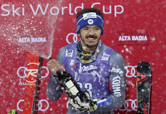 Alpine Skiing - FIS Alpine Skiing World Cup - Men&#039;s Parallel Giant Slalom - Alta Badia, Italy - 19/12/16 - Cyprien Sarrazin of France sprays champagne on the podium. REUTERS/Stefano Rellandini