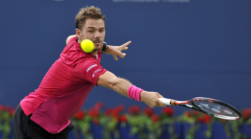 epa05445952 Stan Wawrinka of Switzerland in action against Jack Sock of the USA during the third round of the Rogers Cup Men’s Singles tennis tournament in Toronto, Canada, 28 July 2016. EPA/WARREN TO ...