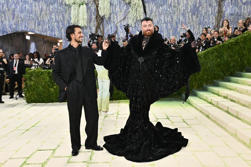 Christian Cowan, left, and Sam Smith arrive at The Metropolitan Museum of Art's Costume Institute benefit gala celebrating the opening of the "Costume Art" exhibition on Monday, May 4,  ...