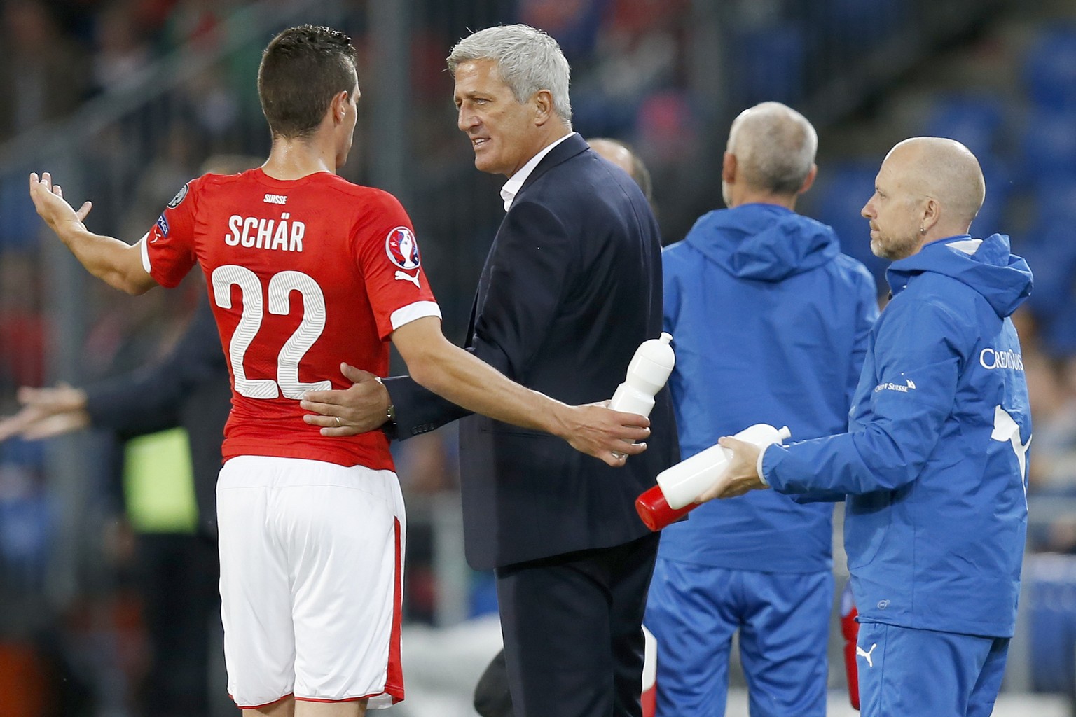 Swiss head coach Vladimir Petkovic talks to his player Fabian Schaer after the UEFA EURO 2016 qualifying soccer match Switzerland against Slovenia at the St. Jakob-Park stadium in Basel, Switzerland,  ...