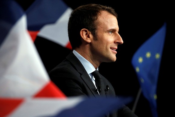 Emmanuel Macron, head of the political movement En Marche !, or Onwards !, and candidate for the 2017 presidential election, attends a meeting in Reims, France March 17, 2017. REUTERS/Pascal Rossignol