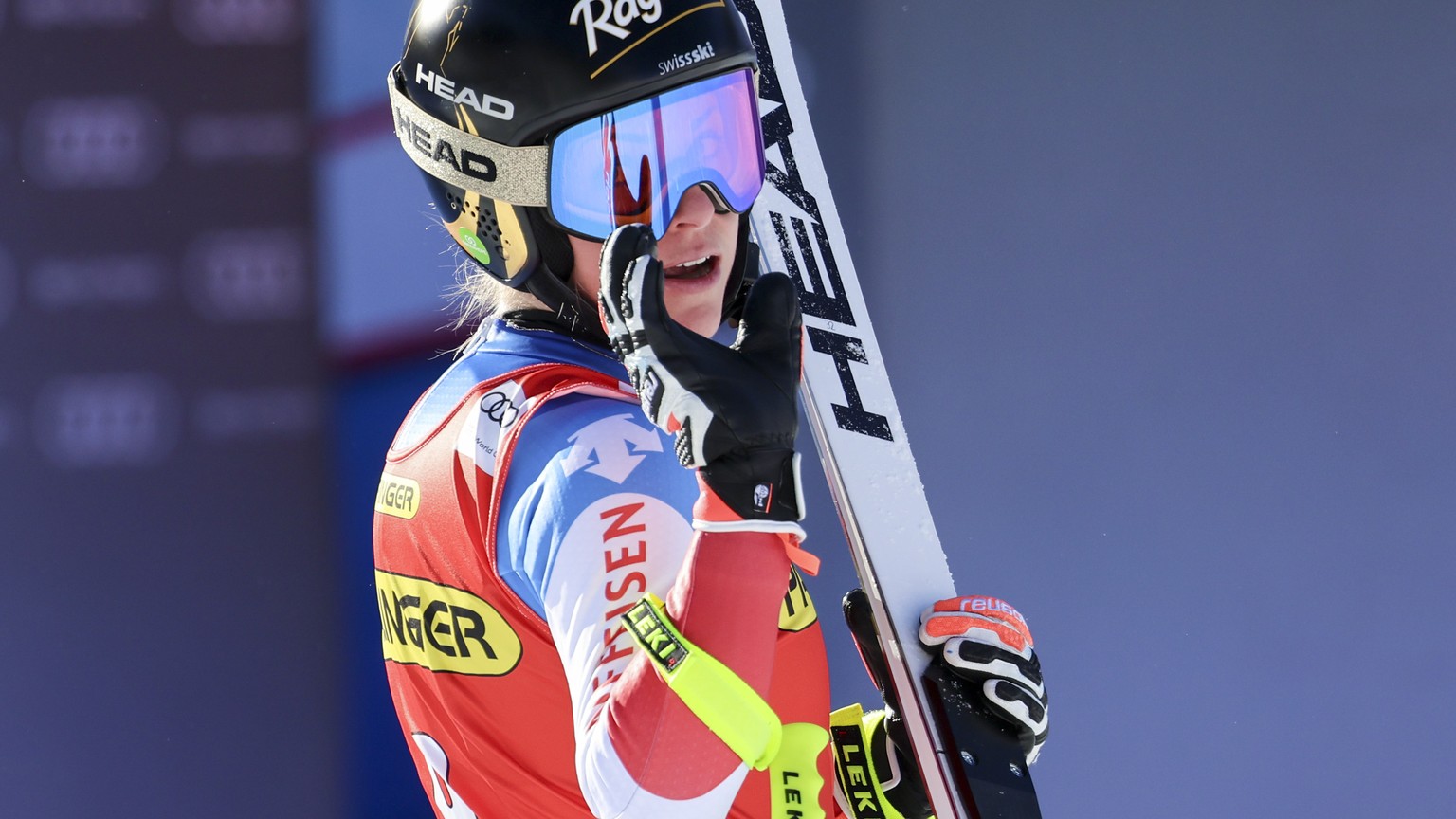 Switzerland&#039;s Lara Gut Behrami crosses the finish line during an alpine ski, women&#039;s World Cup downhill race, in Zauchensee, Austria, Saturday, Jan. 15, 2022. (AP Photo/Marco Trovati)