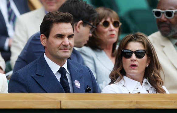 KEYPIX - epa12222367 Swiss tennis legend Roger Federer (L) and wife Mirka watch the Men's Singles Fourth Round match Novak Djokovic of against Alex de Minaur of Australia at the Wimbledon Champio ...