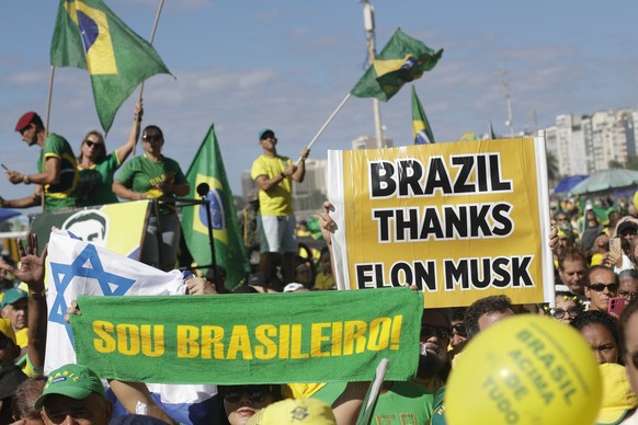 Supporters of former Brazilian President Jair Bolsonaro take part in a demonstration calling for freedom of expression, spurred by Brazilian court orders to suspend accounts on the social media platfo ...