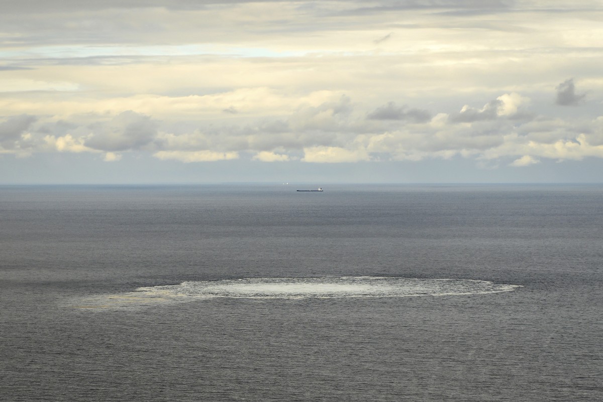 In this photo provided by the Armed Forces of Denmark, a view the disturbance in the water above the gas leak, in the Baltic Sea, Thursday, Sept. 29, 2022. Following the suspected sabotage this week o ...