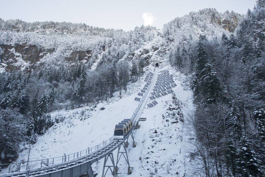 The new and steepest funicular railway in the world, the Stoos Bahn, is ready for the opening ceremony after five years of construction, on Friday, December 15, in Stoos, Switzerland. (KEYSTONE/Urs Fl ...