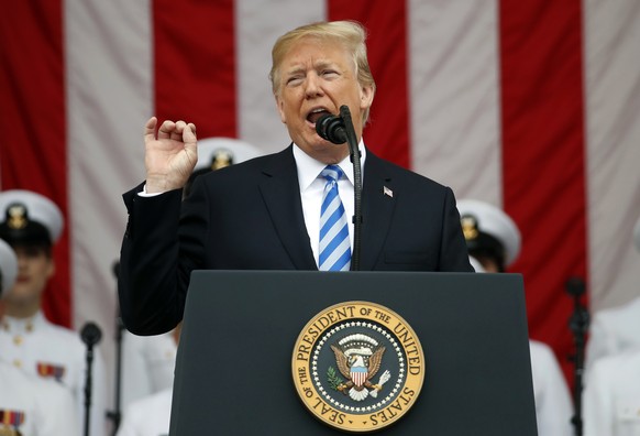 FILE - President Donald Trump speaks at the Memorial Amphitheater in Arlington National Cemetery on Memorial Day, May 28, 2018 in Arlington, Va. (AP Photo/Alex Brandon, File)
Donald Trump