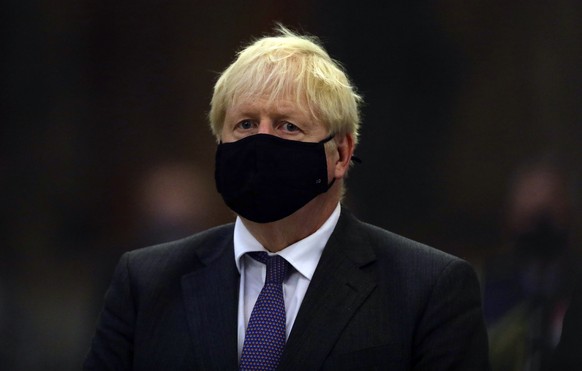 Britain&#039;s Prime Minister Boris Johnson looks on during a service to mark the 80th anniversary of the Battle of Britain at Westminster Abbey, London, Sunday, Sept. 20, 2020. (Aaron Chown/Pool Phot ...