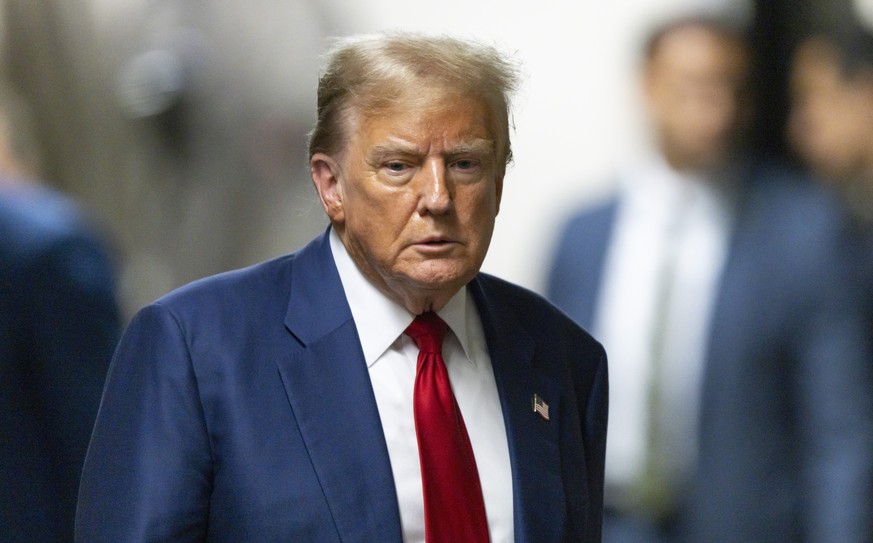 epa11311310 Former US President Donald Trump leaves the courtroom at the end of the day in his criminal trial at New York State Supreme Court in New York, New York, USA, 30 April 2024. Trump is facing ...