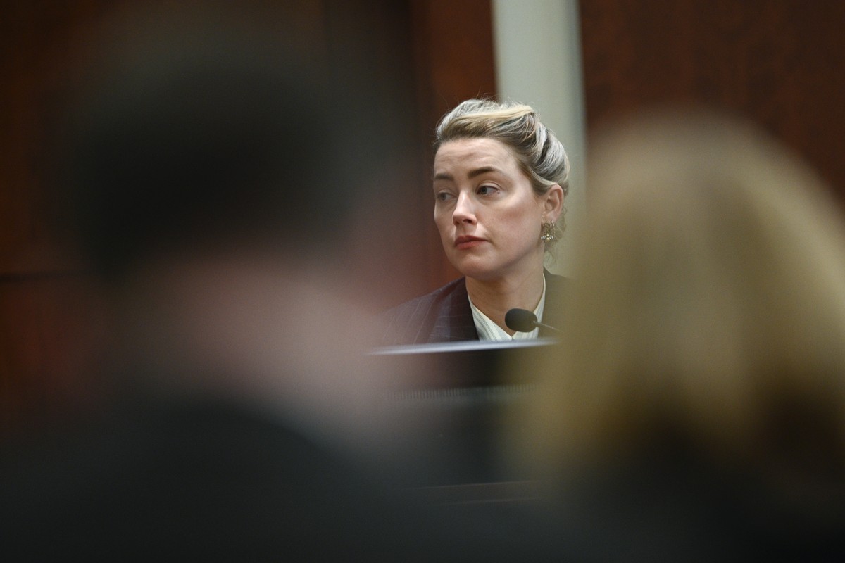 Actor Amber Heard testifies in the courtroom at the Fairfax County Circuit Courthouse in Fairfax, Va., Tuesday, May 17, 2022. Actor Johnny Depp sued his ex-wife Amber Heard for libel in Fairfax County ...
