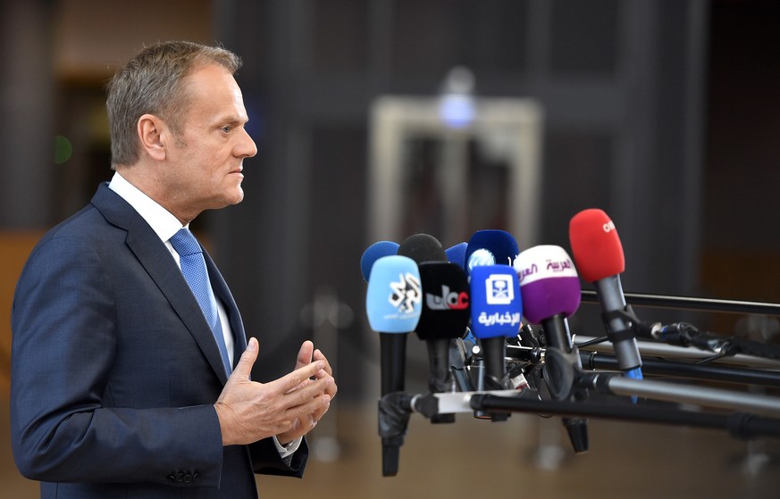 European Council President Donald Tusk speaks with the media as he arrives for an EU summit at the Europa building in Brussels on Saturday, April 29, 2017. EU Council President Donald Tusk says that B ...