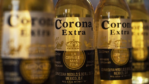 epa08252549 (FILE) - Bottles of Corona beer pictured in London, Britain, 28 September 2016 (reissued 27 February 2020). Reports on 27 February 2020 state the sales of Corona beer have fallen drastical ...