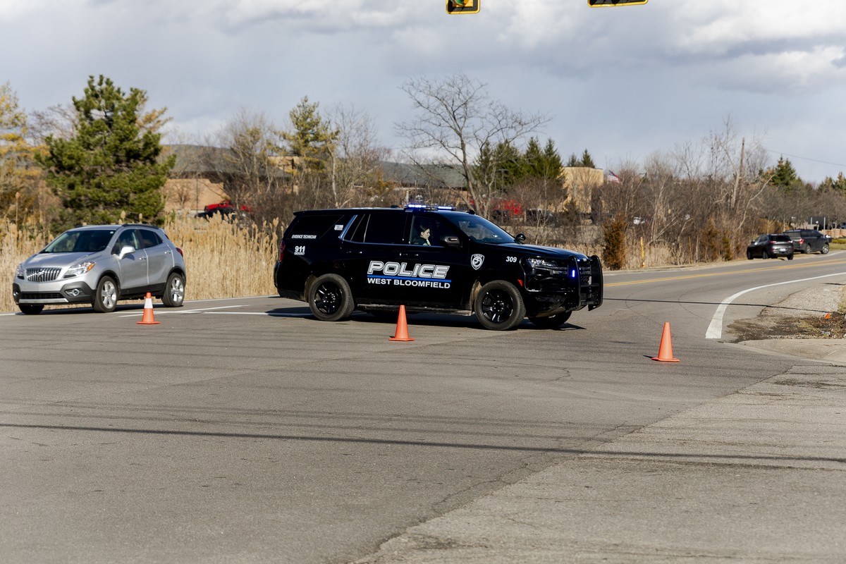 epa12815799 A police car is seen after a shooting at Temple Israel in West Bloomfield, near Detroit, Michigan, USA, 12 March 2026. Detroit?area law enforcement agencies responded to reports of an acti ...