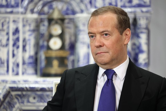 epa10819781 Deputy head of Russia&#039;s Security Council and chairman of the United Russia party, Dmitry Medvedev during his meets with President of the Republic of Abkhazia Aslan Bzhania and Preside ...