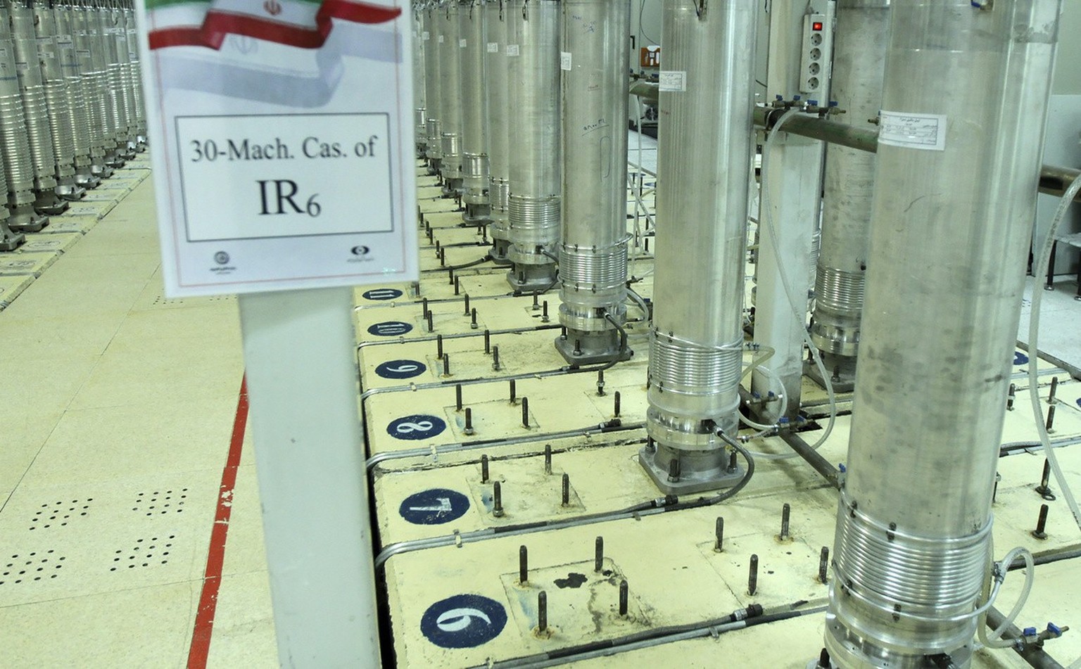 FILE - This photo released Nov. 5, 2019, by the Atomic Energy Organization of Iran shows centrifuge machines in Natanz uranium enrichment facility near Natanz, Iran. A new underground facility at the  ...