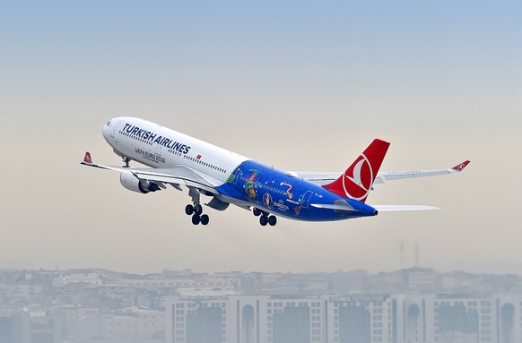 IMAGE DISTRIBUTED FOR TURKISH AIRLINES - In this image released on Wednesday, April 13, 2016, a Turkish Airlines A330-300 aircraft begins its maiden flight to Paris painted in the UEFA EURO 2016 com ...