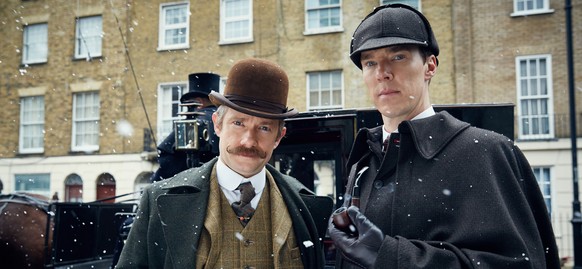 In this image released by PBS, Martin Freeman, left, and Benedict Cumberbatch appear in MASTERPIECE&#039;s &quot;Sherlock: The Abominable Bride.&quot; On Thursday, July 14, 2016, Cumberbatch was nomin ...