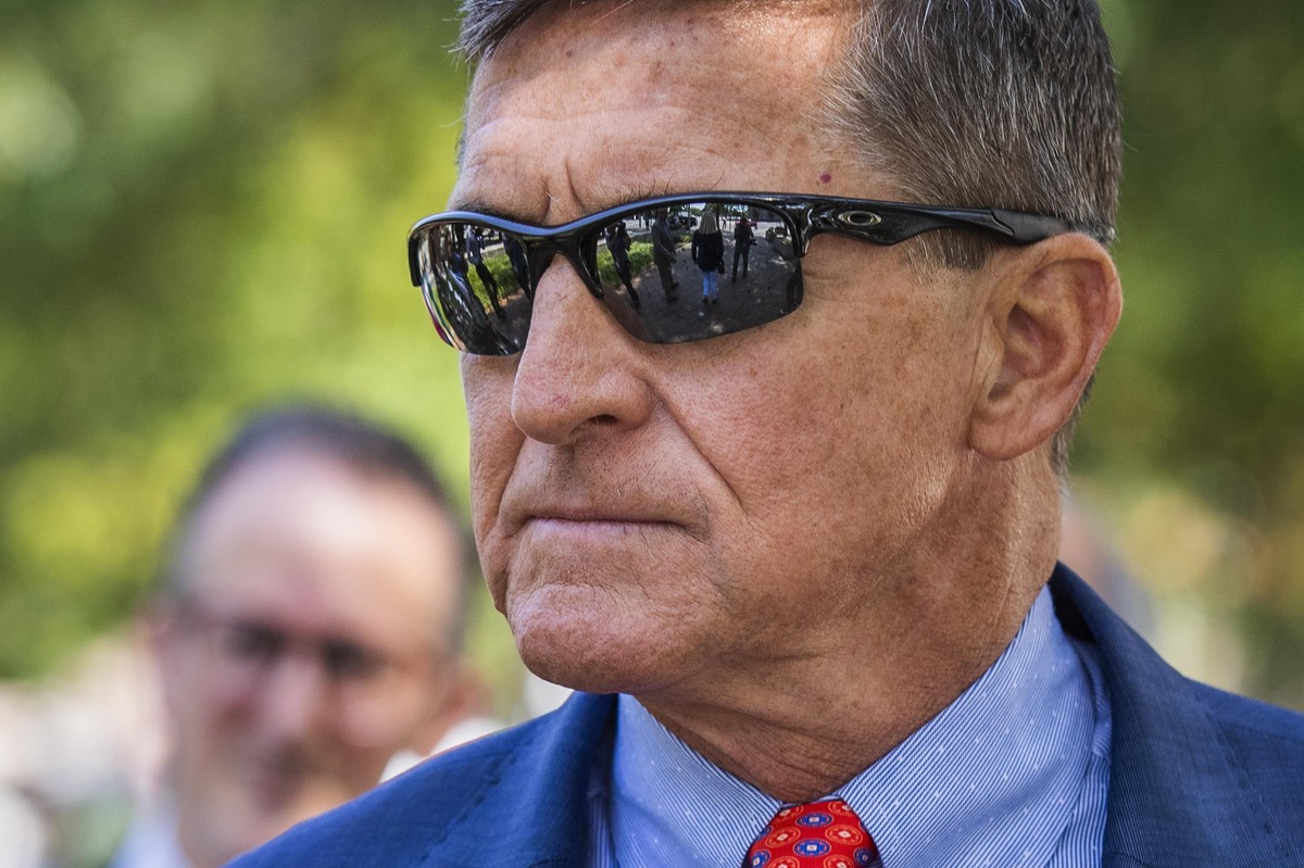 FILE - In this Sept. 10, 2019, file photo Michael Flynn, President Donald Trump's former national security adviser, leaves the federal court following a status conference with Judge Emmet Sulliva ...