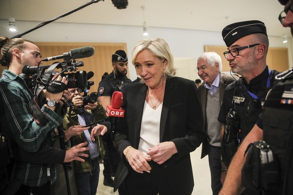 epaselect epa11658323 The French extreme right leader of the Rassemblement National (RN), Marine Le Pen, arrives at Paris courthouse for a trial accused of creating fake jobs to embezzle European Parl ...