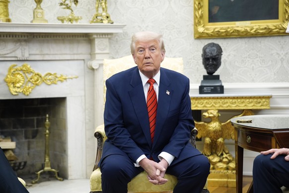 epa11961724 US President Donald Trump looks on during his meeting with NATO Secretary General Mark Rutte in the Oval Office of the White House in Washington, DC, USA, 13 March 2025. EPA/YURI GRIPAS /  ...