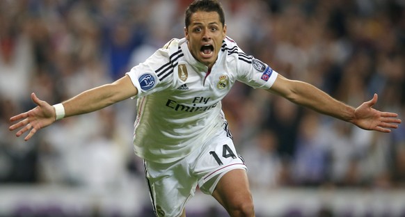 FILE - In this Wednesday April 22, 2015 file photo Real Madrid&#039;s Chicharito celebrates scoring his side&#039;s first goal during the second leg quarterfinal Champions League soccer match between  ...