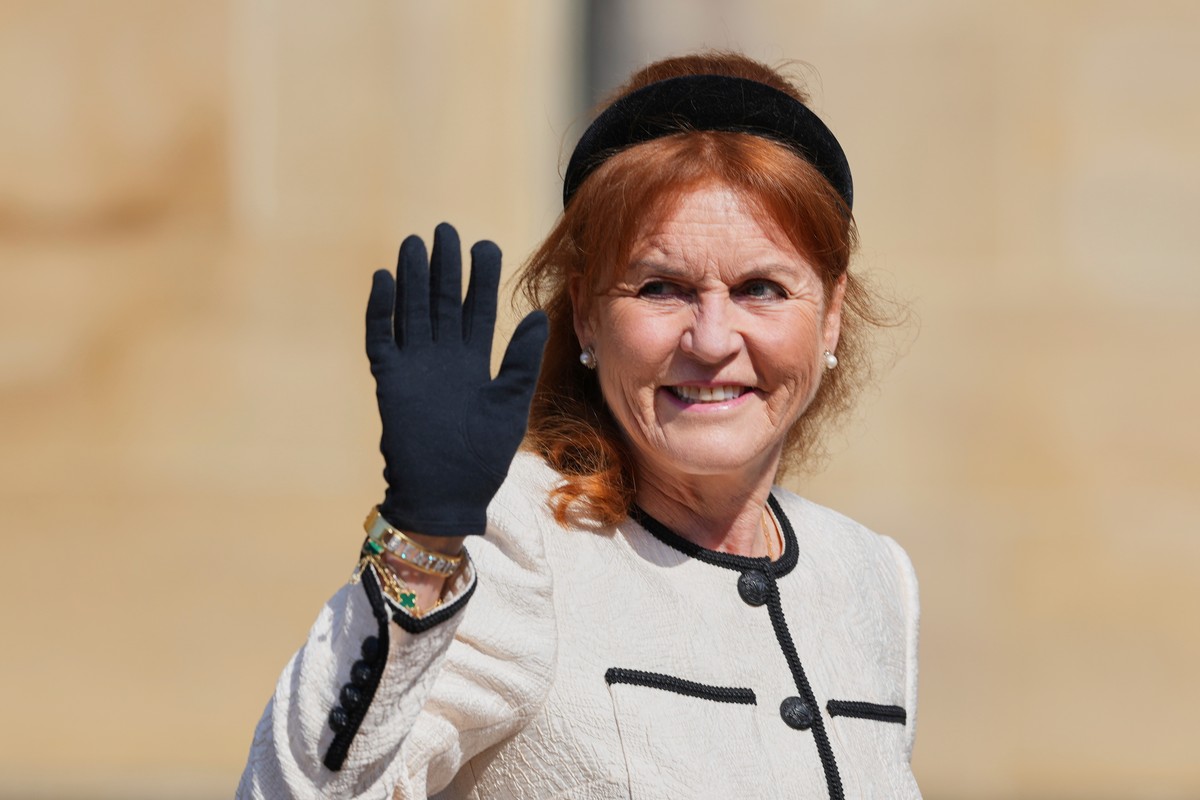 FILE - Sarah Ferguson waves the to the crowd was she attends the Easter Matins Service at St. George's Chapel, Windsor Castle, England, Sunday, April 20, 2025. (AP Photo/Kirsty Wigglesworth, file ...