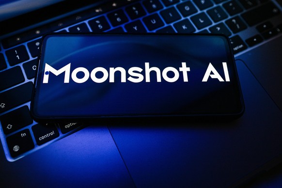 June 8, 2026, Poland: In this photo illustration, a MoonShot AI logo is seen displayed on a smartphone on the top of a laptop. Poland PUBLICATIONxINxGERxSUIxAUTxONLY - ZUMAs197 20260608_aaa_s197_021 C ...