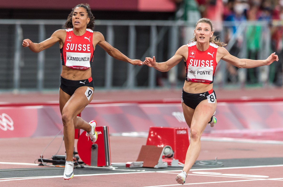 Ajla Del Ponte, right, and Mujinga Kambundji, left, finish the final of the women's 100 m in ranks five (Del Ponte) and six (Kambundji) at the 2020 Tokyo Summer Olympics Games in Tokyo, Japan, on ...