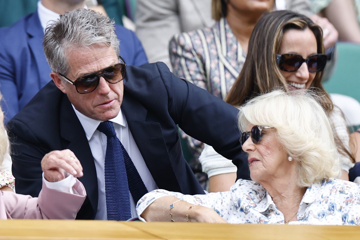 epa12226886 British actor Hugh Grant talks to Britain's Queen Camilla at the Wimbledon Championships, Wimbledon, Britain, 09 July 2025. EPA/TOLGA AKMEN EDITORIAL USE ONLY