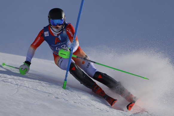 Switzerland&#039;s Tanguy Nef speeds down the course during an alpine ski, men&#039;s World Cup slalom in Gurgl, Austria, Saturday, Nov. 18, 2023. (AP Photo/Giovanni Pizzato)