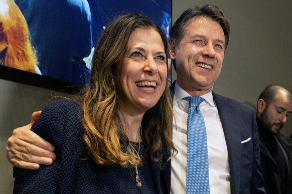 epa11184129 Five Star Movement (M5S) leader Giuseppe Conte (R) with Alessandra Todde at the end of a press conference after her victory in the Sardinian regional election, in Cagliari, Sardinia island ...