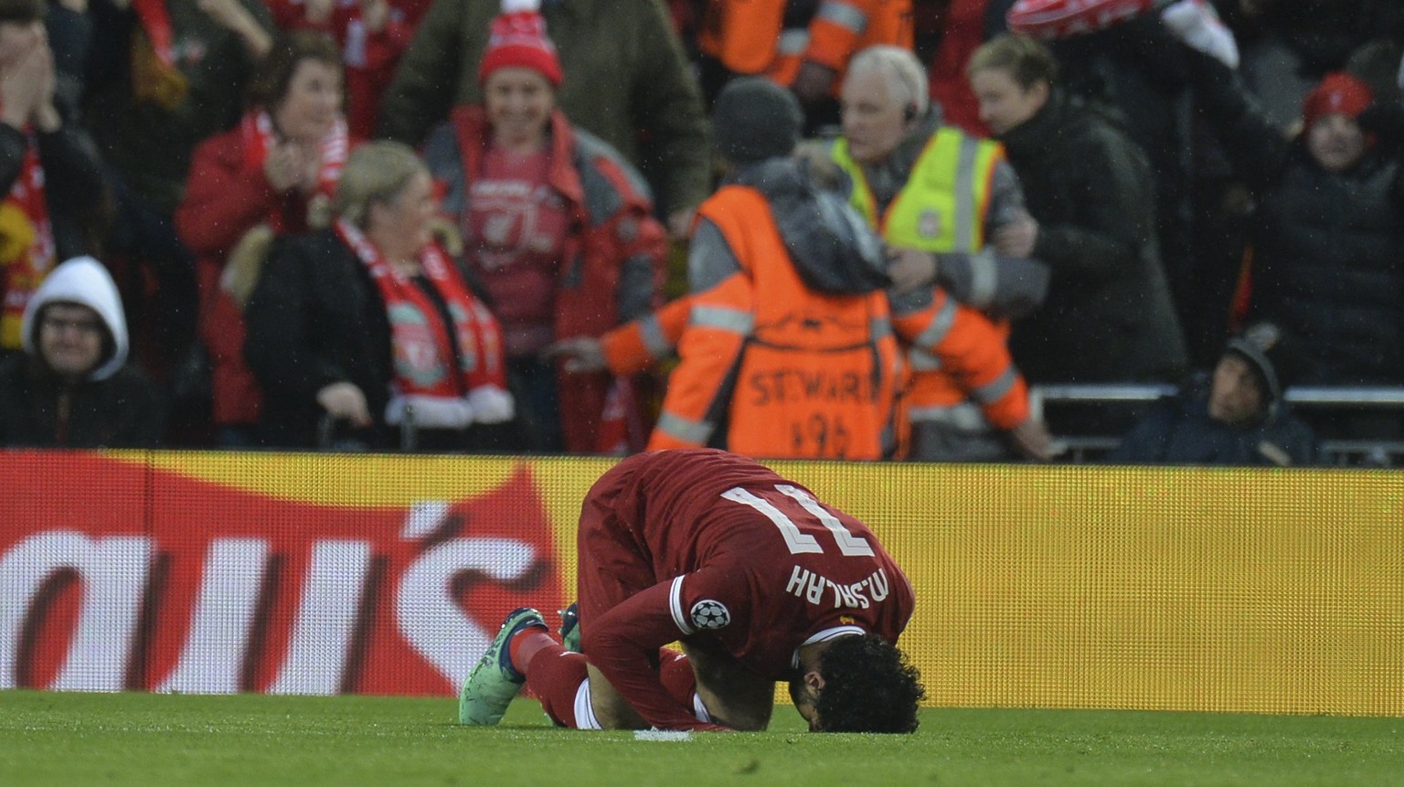 epa06690044 Liverpool&#039;s Mohamed Salah celebrates scoring the 1-0 goal during the UEFA Champions League semi final, first leg soccer match between Liverpool FC and AS Roma at Anfield, Liverpool, B ...