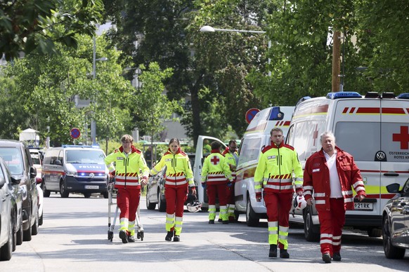 Rescue service personnel attend the scene of a shooting at a school in Graz, Austria, Tuesday, June 10, 2025. (Kleine Zeitung via AP)
Austria School Police