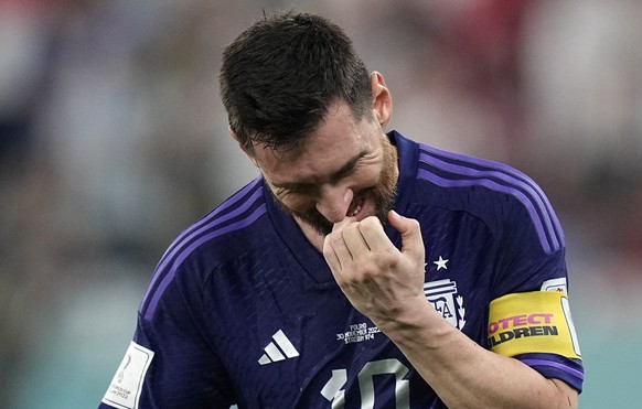 Argentina&#039;s Lionel Messi reacts after misses an opportunity to score a penalty kick during the World Cup group C soccer match between Poland and Argentina at the Stadium 974 in Doha, Qatar, Wedne ...