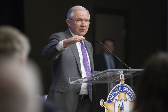 epa06709701 US Attorney General Jeff Sessions delivers remarks at the National Sheriffs&#039; Association DC Opioid Roundtable, in Washington, DC, USA, 03 May 2018. EPA/MICHAEL REYNOLDS