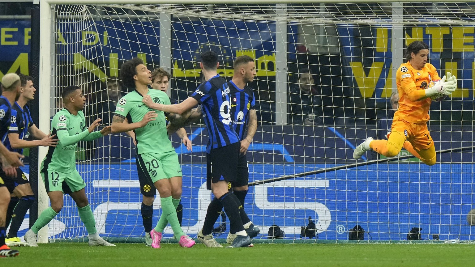 Inter Milan&#039;s goalkeeper Yann Sommer saves a ball during the Champions League, round of 16, first leg soccer match between Inter Milan and Atletico Madrid, at the San Siro stadium in Milan, Italy ...