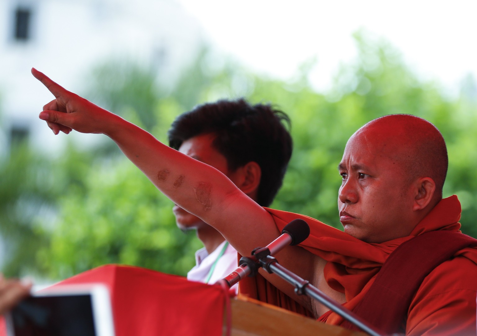 epa06171586 Nationalist Buddhist monk Wirathu reacts as he delivers a speech during a rally against Kofi Annan&#039;s commission report and the recent attacks reportedly carried by the ARSA (Arakan Ro ...