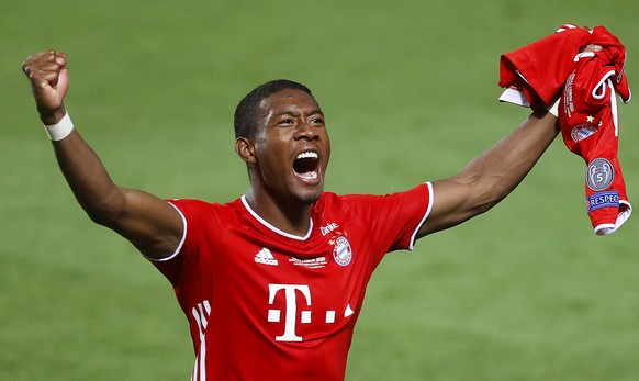 epa08620893 David Alaba of Munich celebrates after the UEFA Champions League final between Paris Saint-Germain and Bayern Munich in Lisbon, Portugal, 23 August 2020. Bayern Munich won 1-0. EPA/Matt Ch ...