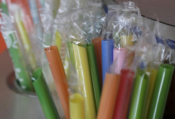 FILE - This July 17, 2018, file photo, shows wrapped plastic straws at a bubble tea cafe in San Francisco. Avoiding single-use plastics like straws, plastic bags and water bottles is easier than it se ...