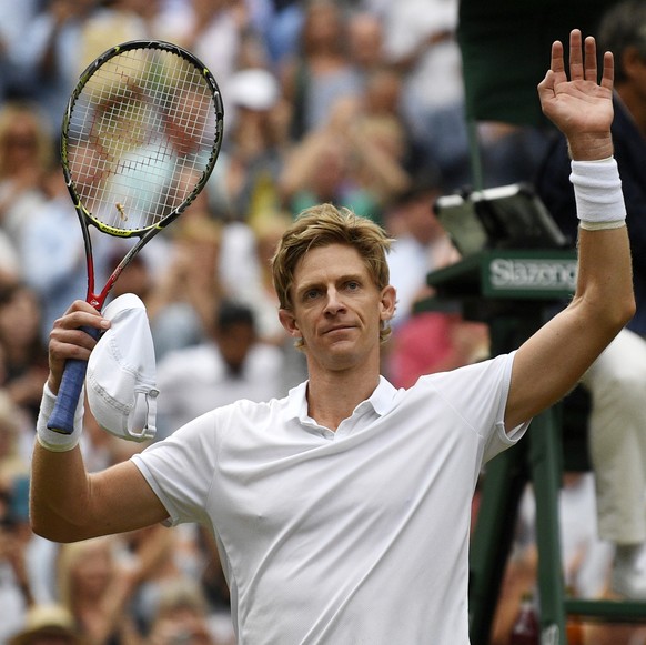 epa06886523 Kevin Anderson of South Africa celebrates after beating John Isner of the US in their semi final match during the Wimbledon Championships at the All England Lawn Tennis Club, in London, Br ...