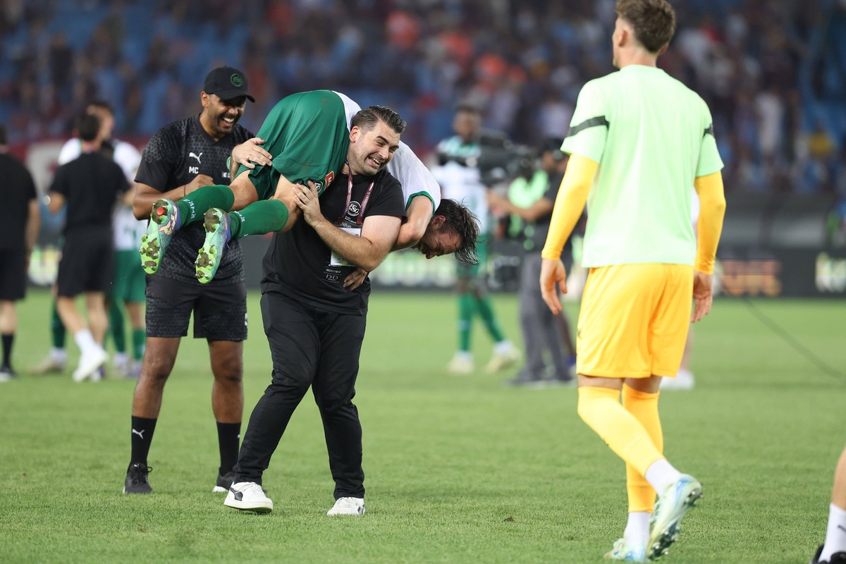 St Gallen players celebrated their victory and the joy of qualifying for theUEFA Conference League after during the UEFA Conference League Play-Offs Second Leg match between Trabzonspor and St Gallen  ...