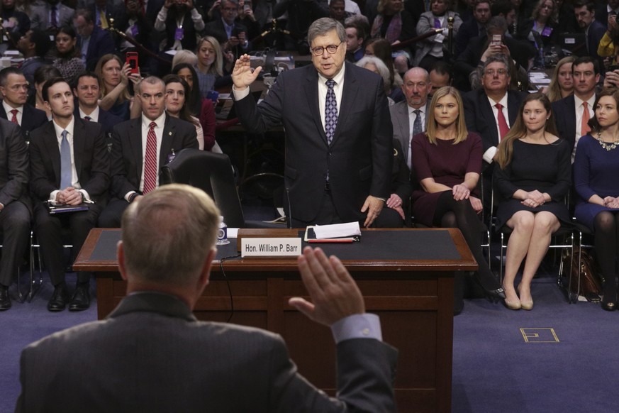 epa07287302 Attorney General nominee William Barr (C) is sworn in before the Senate Judiciary Committee, behind Chairman of the committee Republican Lindsey Graham (Bottom) during Barr&#039;s confirma ...