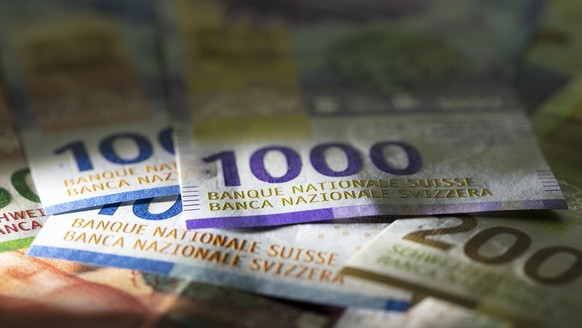 Detail view of the nineth Swiss banknote series: ten, twenty and fifty, hundred, two hundred and thousand Swiss franc note, photographed on November 7, 2019. (KEYSTONE/Gaetan Bally)

Detailansicht der ...