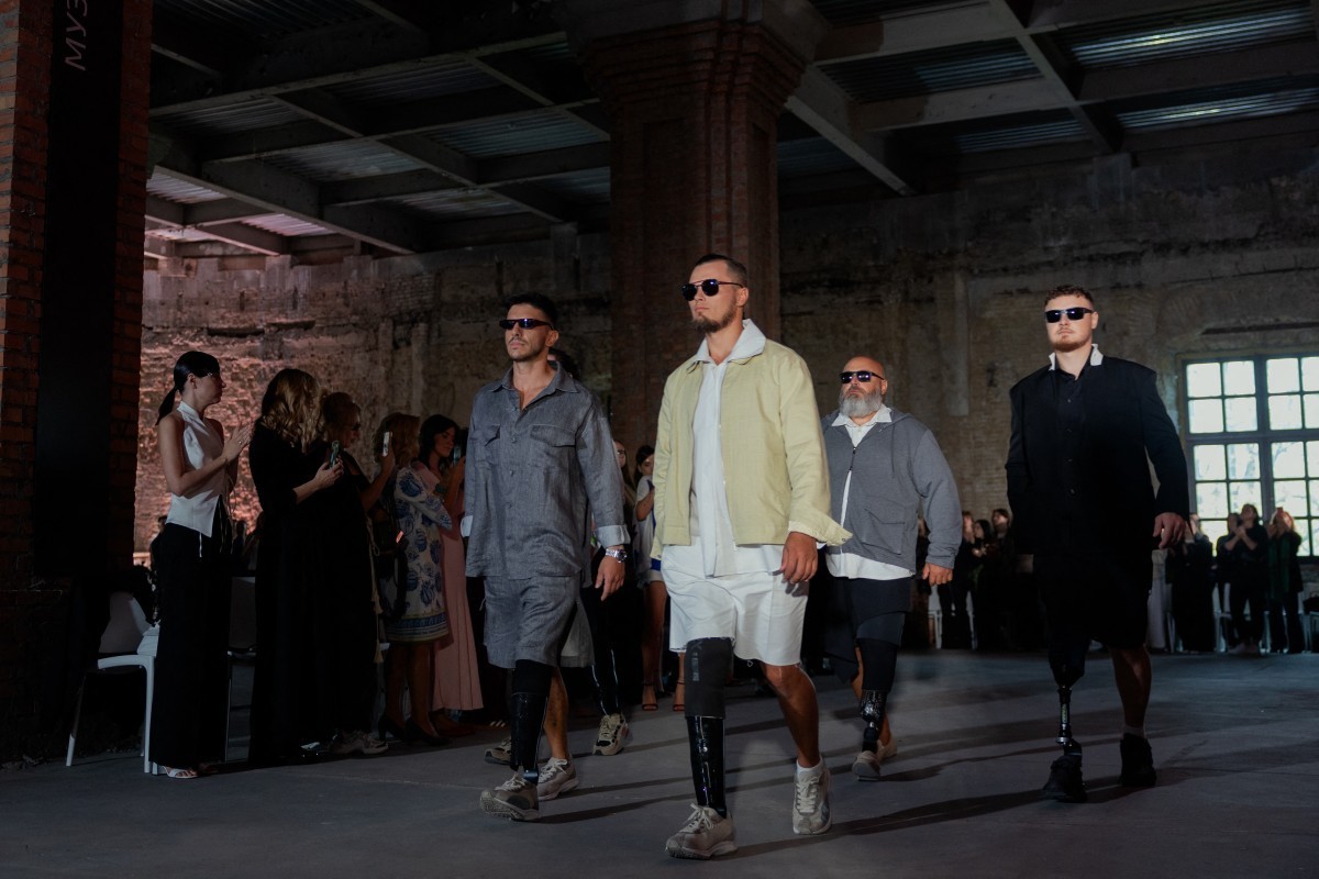 Ukrainian veterans walk down the runway during the Sidletskiy fashion show in collaboration with the U+System Military Prosthetics Center during Ukrainian Fashion Week in Kyiv on September 6, 2026, am ...