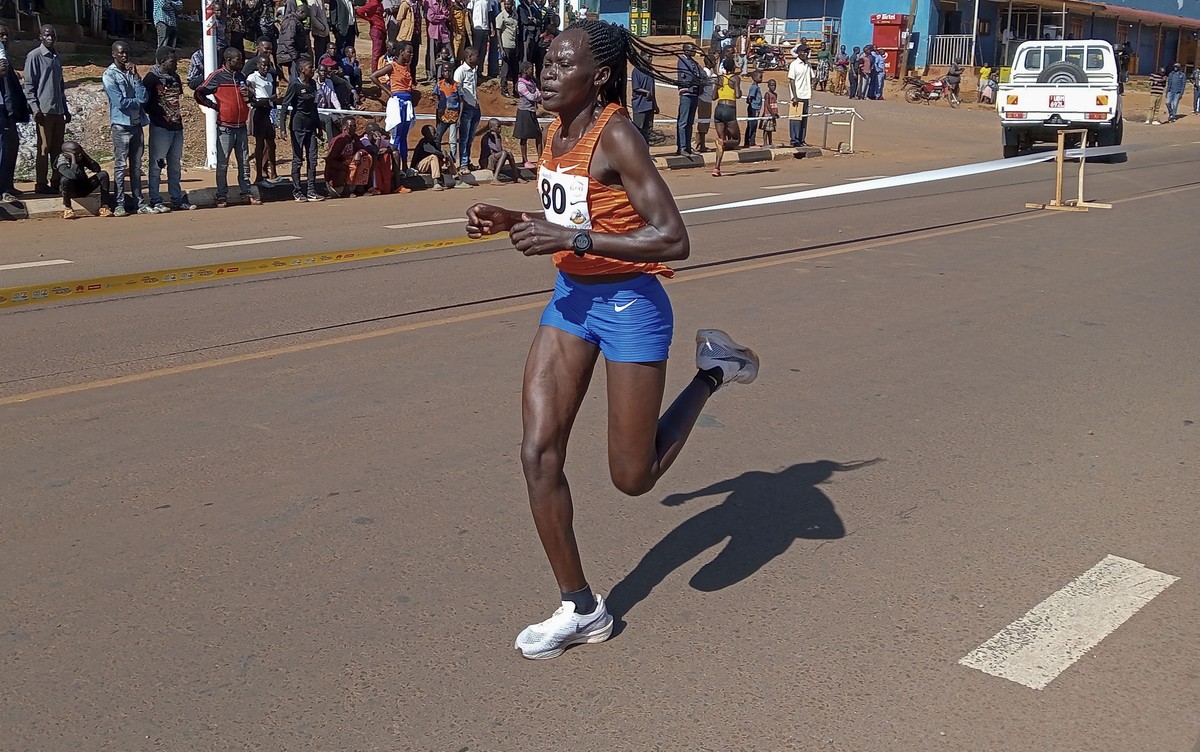 FILE -Rebecca Cheptegei, competes at the Discovery 10km road race in Kapchorwa, Uganda, Jan. 20, 2023. (AP Photo, File)