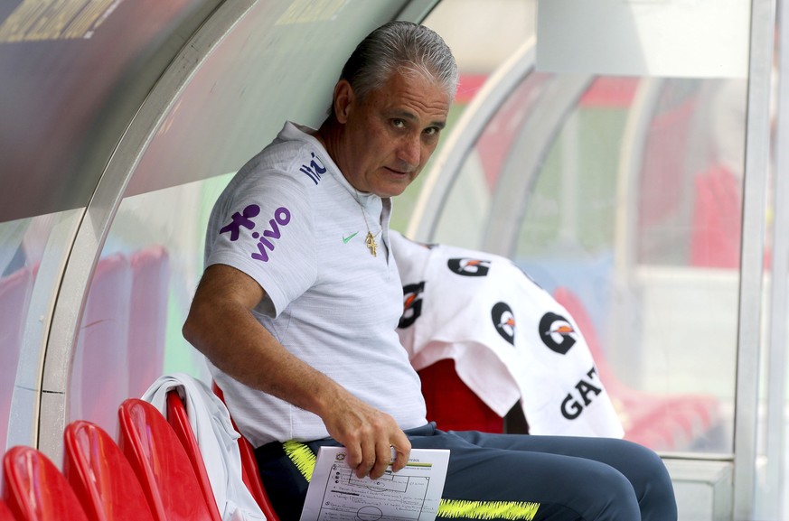 Brazil&#039;s head coach Tite looks during a national soccer squad training session at the Ernst Happel Stadium in Vienna, Austria, Sturday, June 9, 2018. (AP Photo/Ronald Zak)