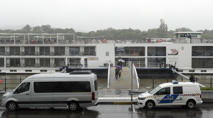 The Viking Sigyn hotel ship is moored following a collision with a sightseeing boat in Budapest, Hungary, Thursday, May 30, 2019. A massive search was underway on the Danube River in downtown Budapest ...
